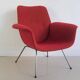 Red armchair with metal legs