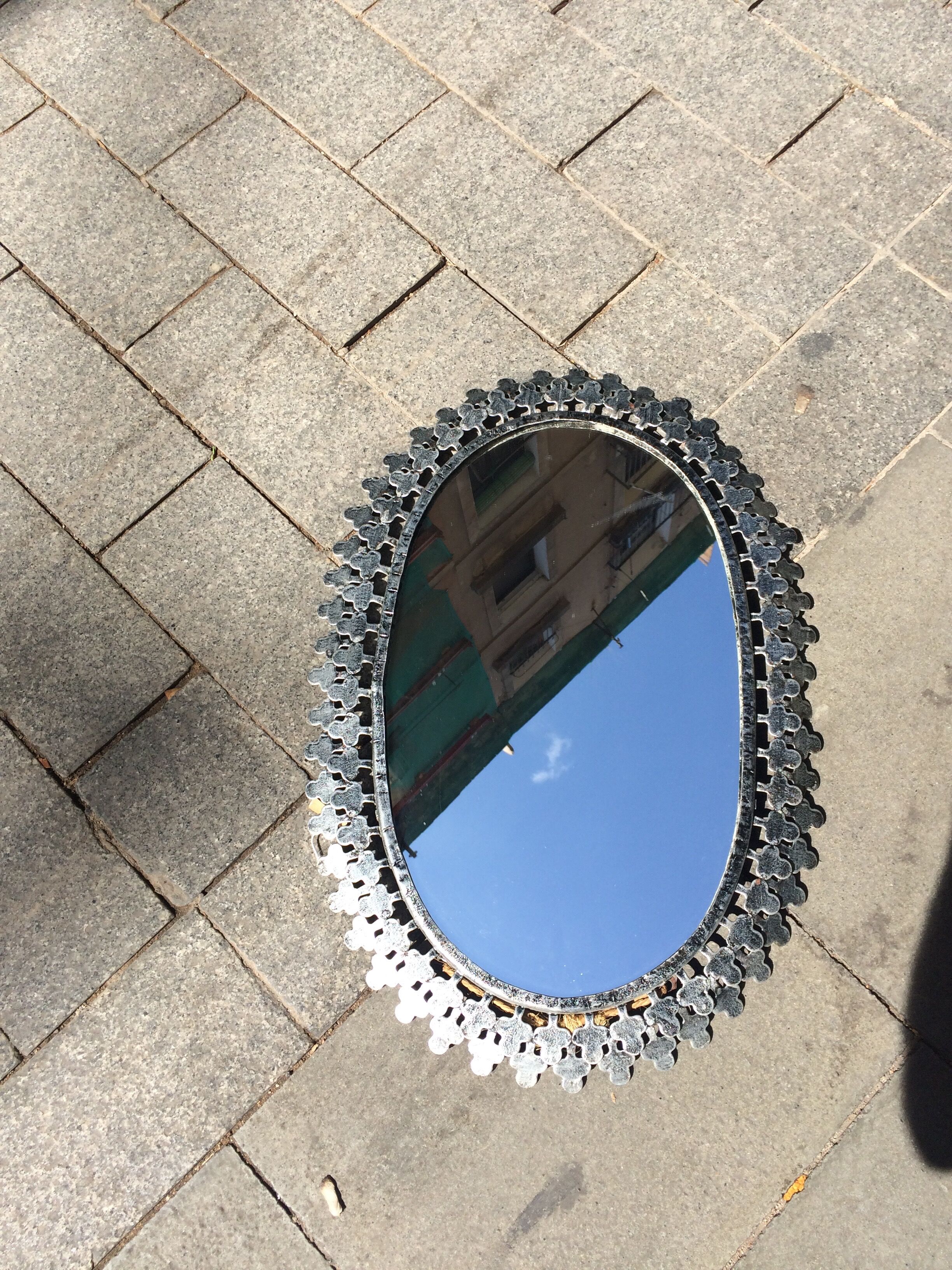 Metal oval mirror