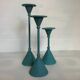 Trio of candlesticks patinated blue green vintage