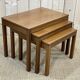 Suite of 3 teak pull-out tables from the 70s