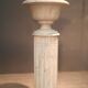 Column topped with a plaster basin.
