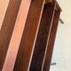 Vintage veneer bookcase with metal legs