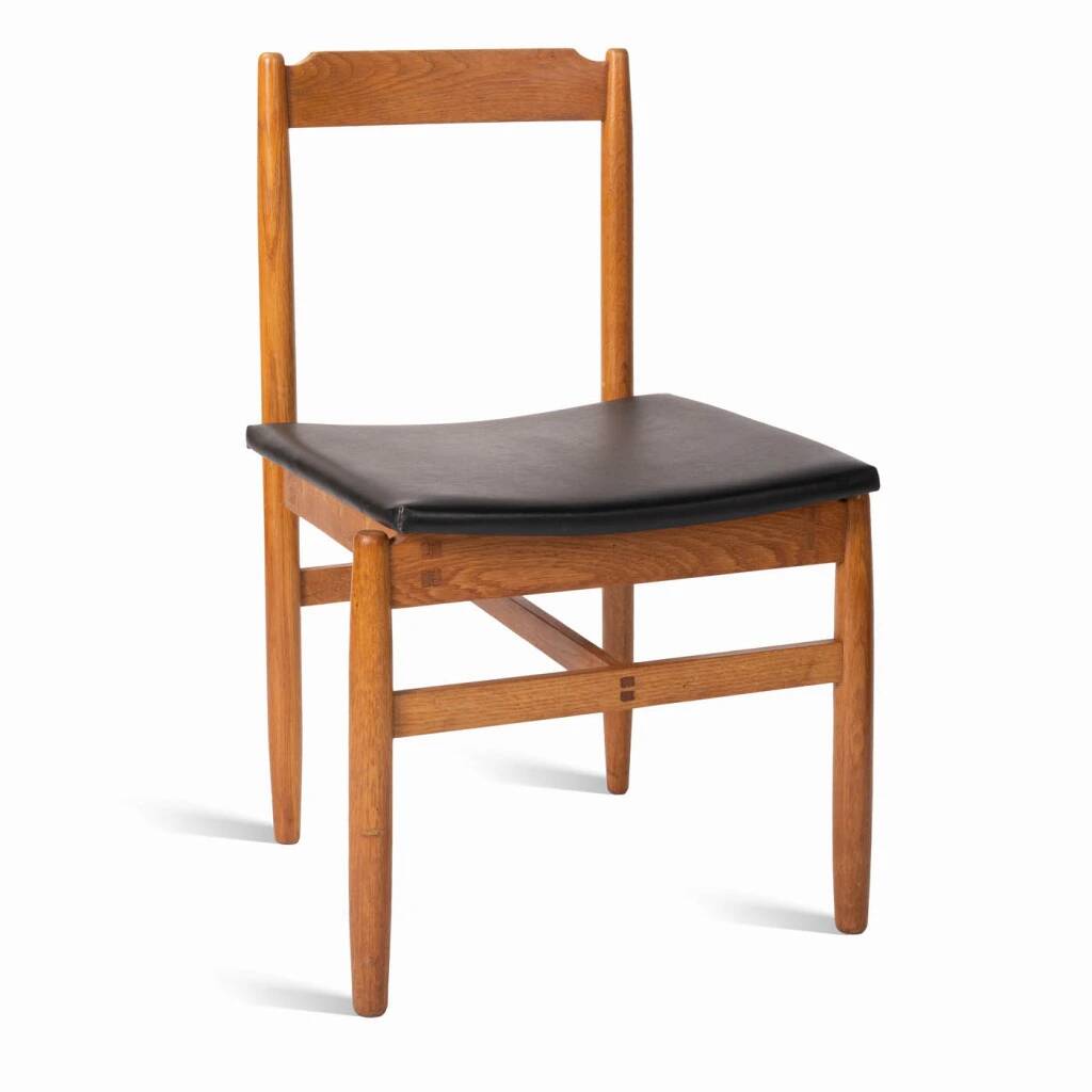 Oak chair with a black leather seat made in the 1960s
