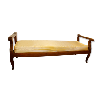 Antique bench with armrests