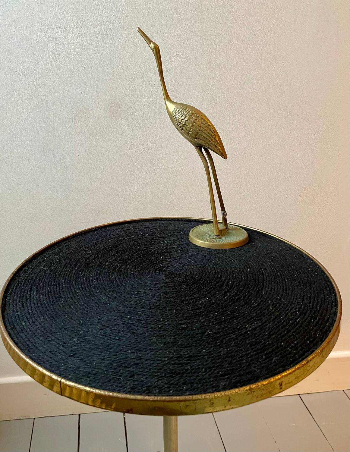 Vintage tripod pedestal table in gold metal