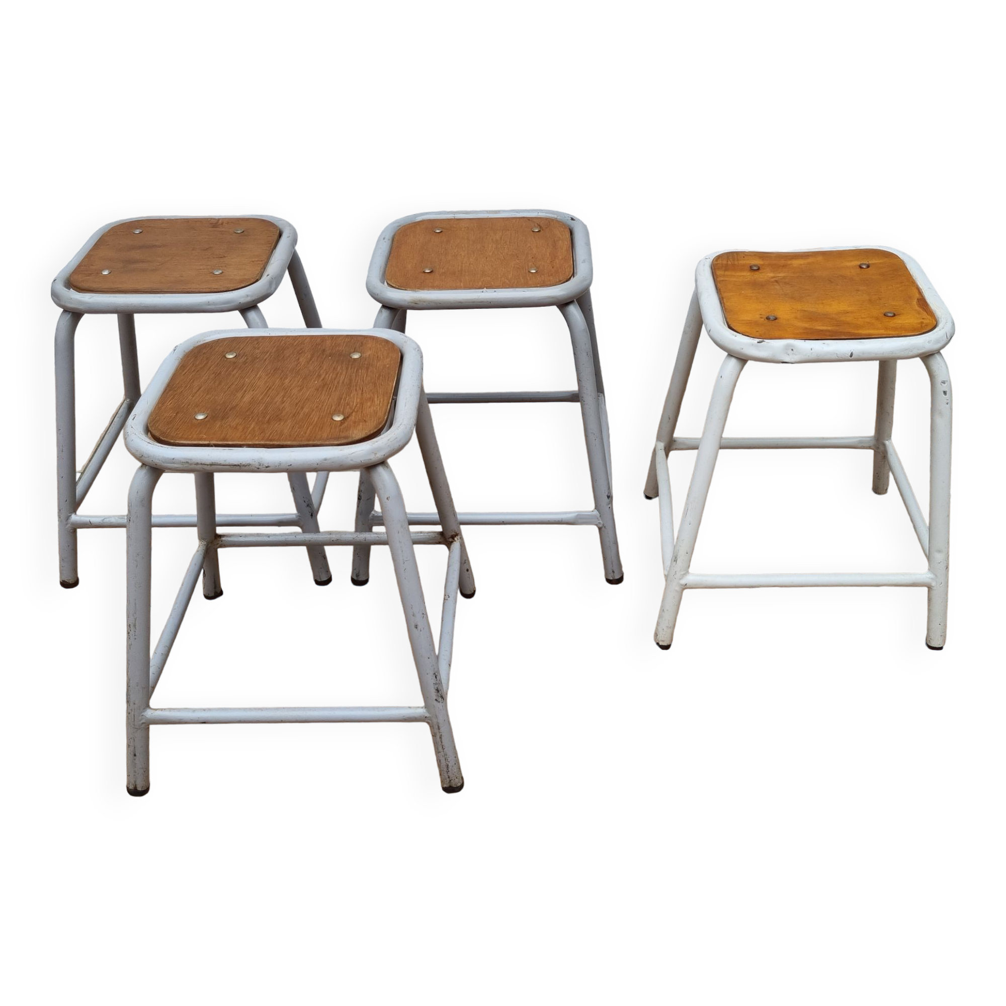 Set of four stackable industrial tubular metal and wood stools