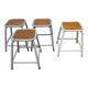 Set of four stackable industrial tubular metal and wood stools