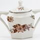 Lot teapot and sugar flowers in ancient ceramic
