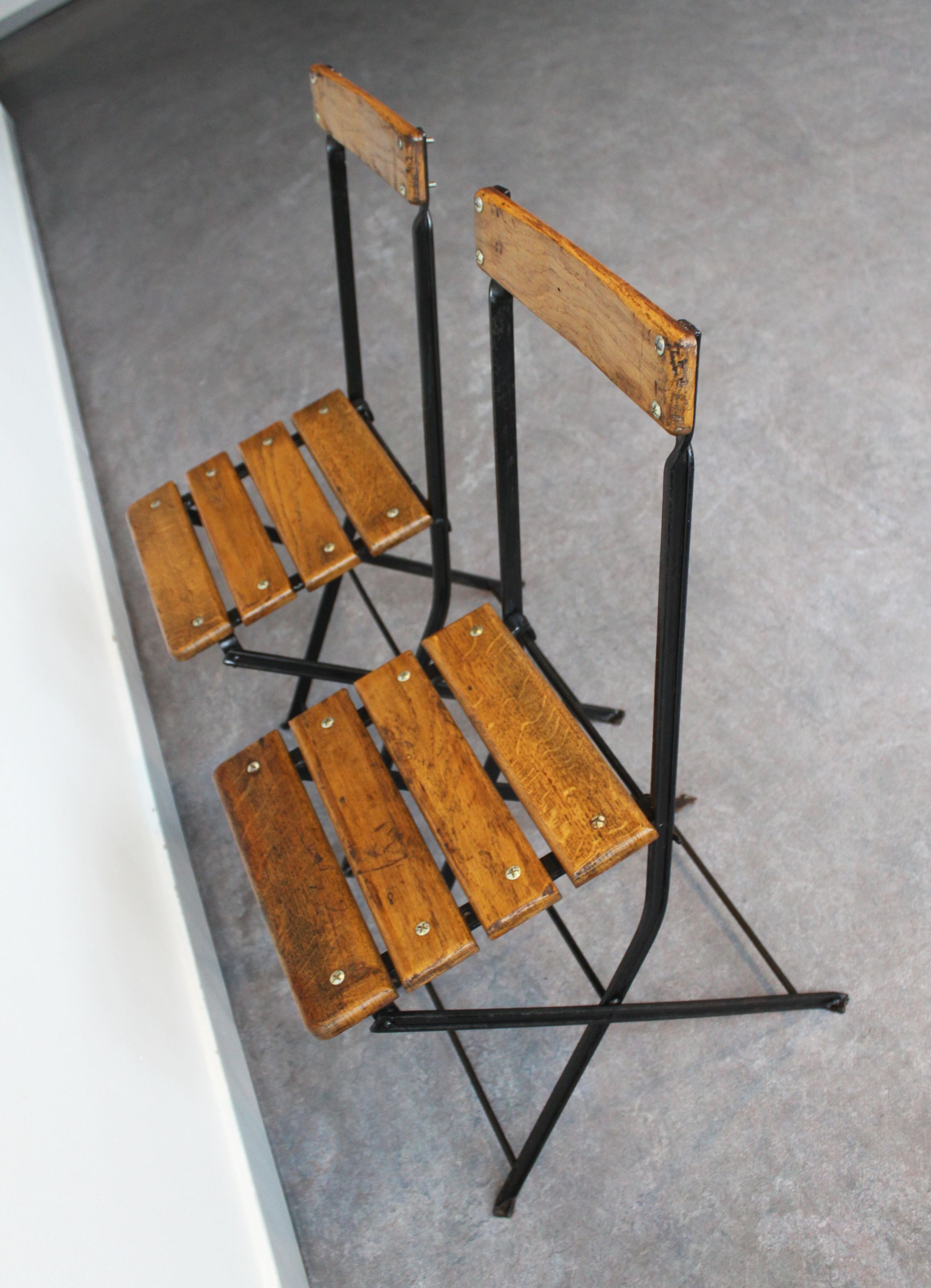 Pair of folding bistro chairs, France, 1930