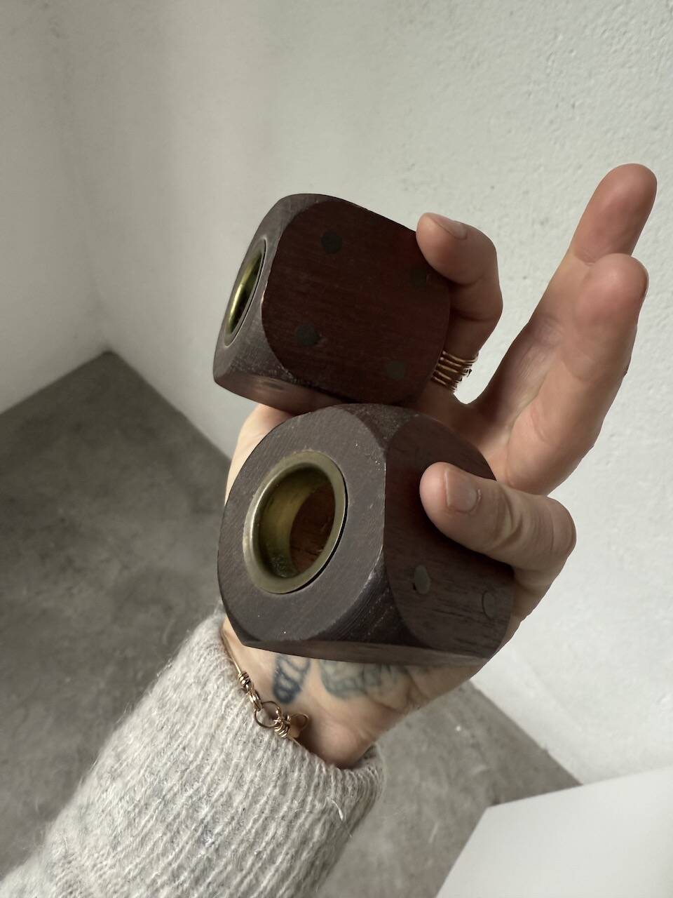 Pair of 1960s teak and brass "dice" candlesticks