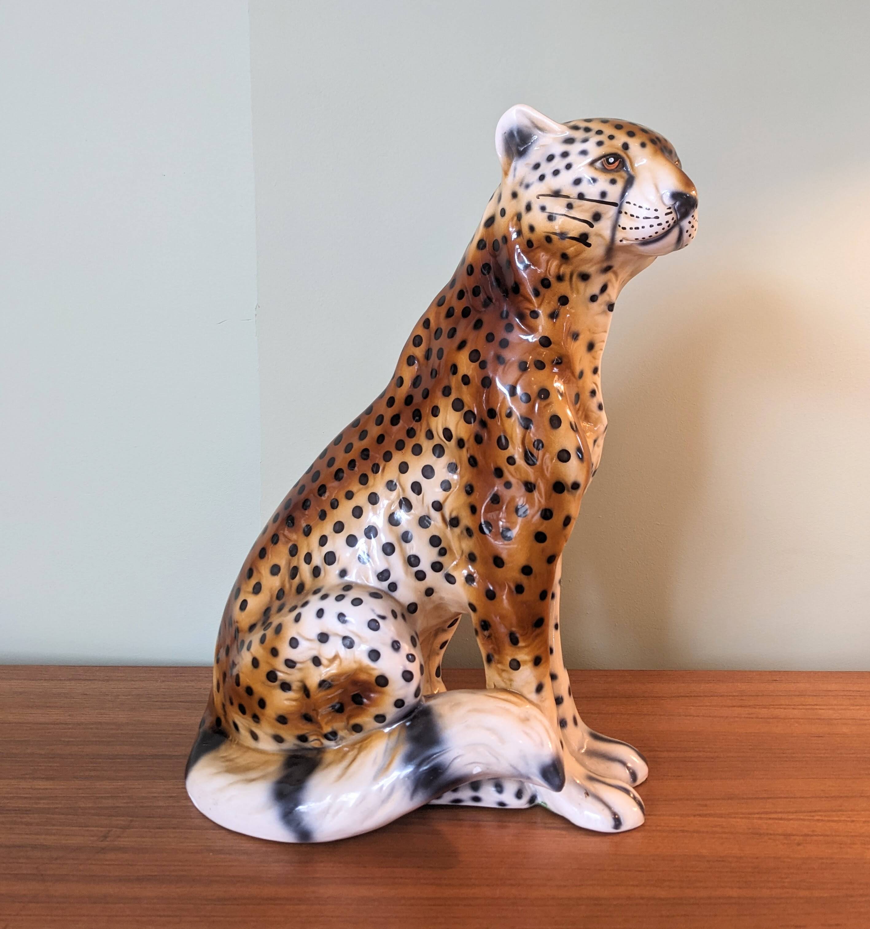Cheetah sculpture in ceramic