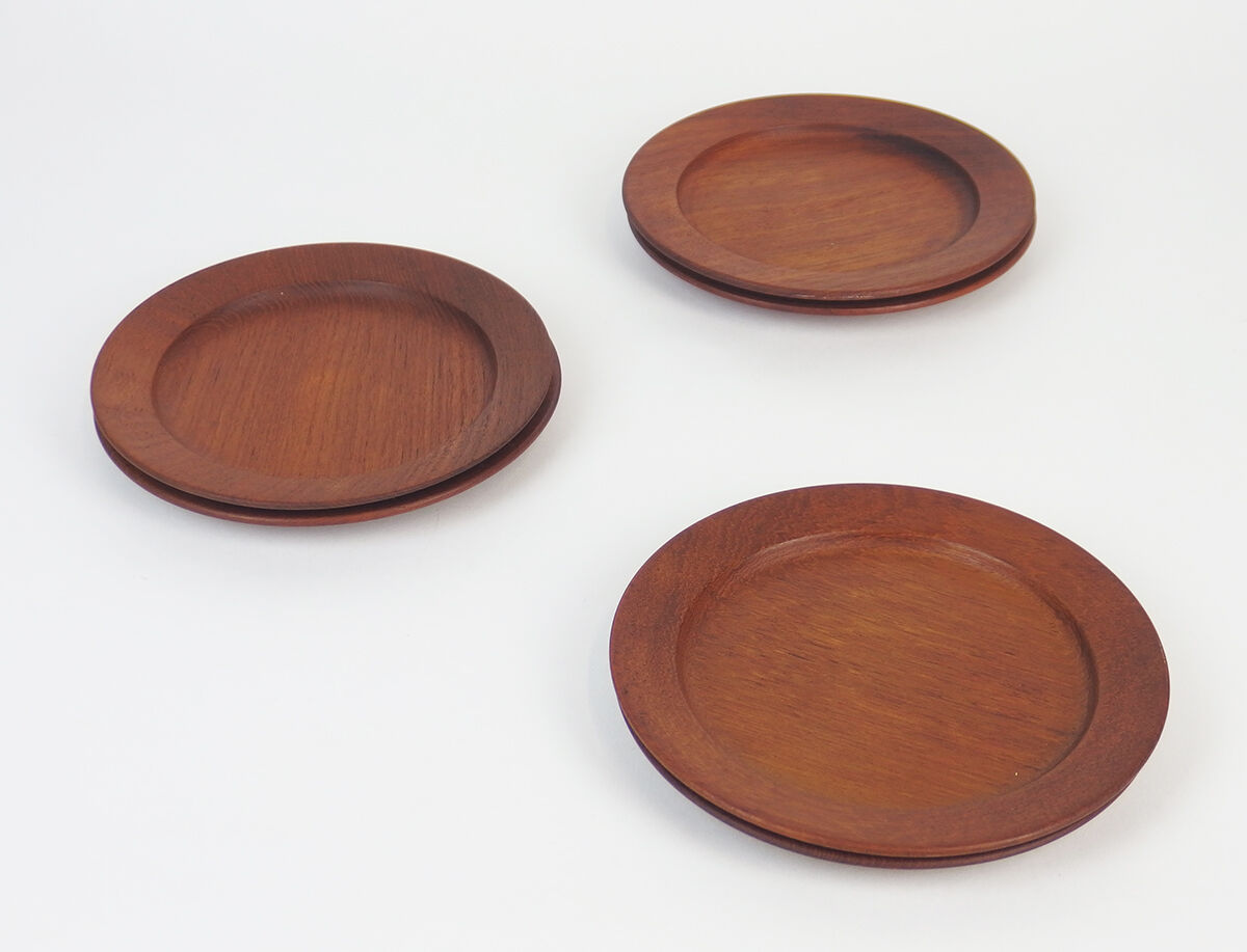 Six Danish teak dessert plates including three marked Kay Bojesen