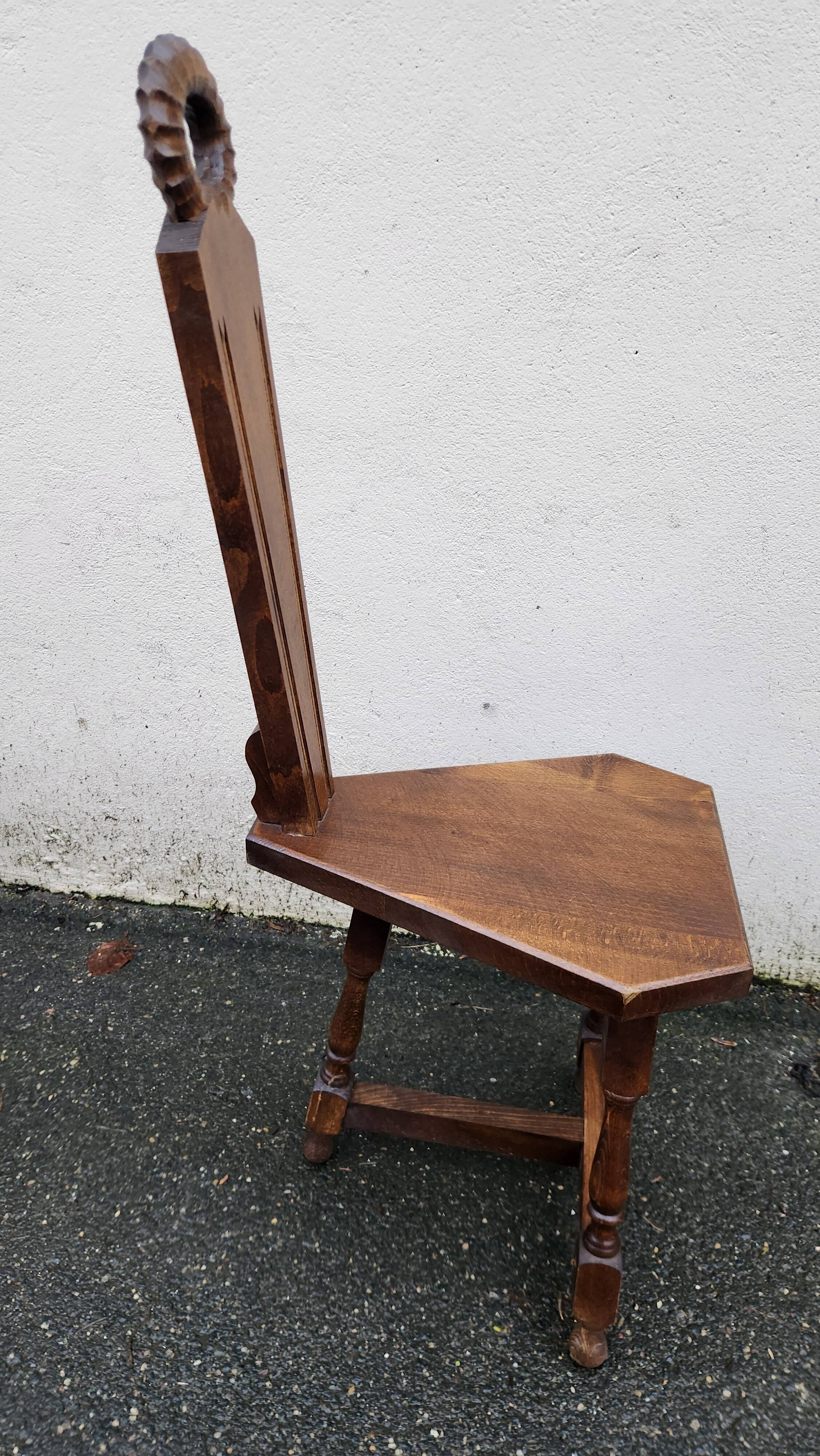 2 three-legged chairs made of solid wood