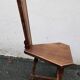 2 three-legged chairs made of solid wood