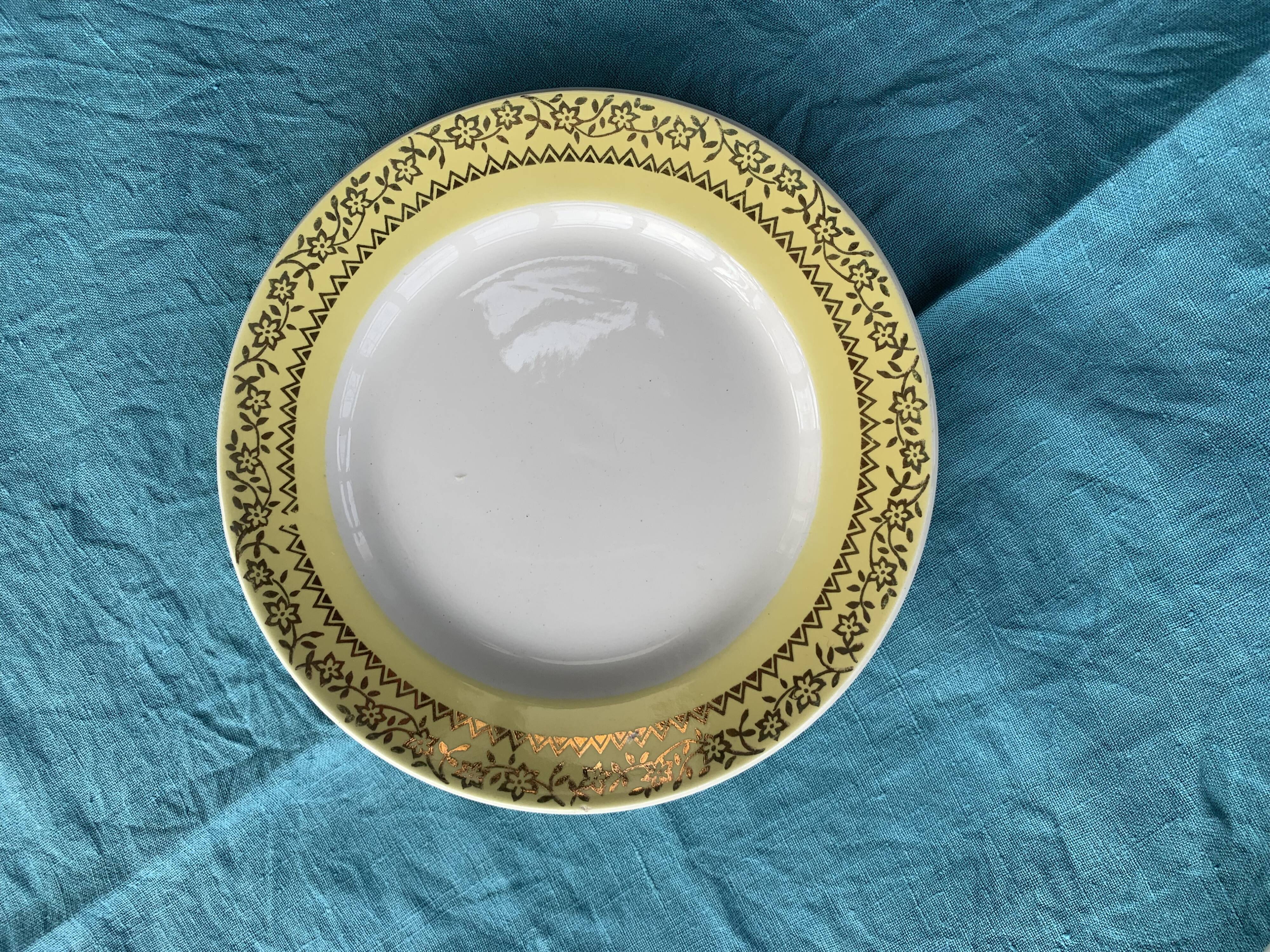 6 small plates with yellow borders and floral pattern gold antiques