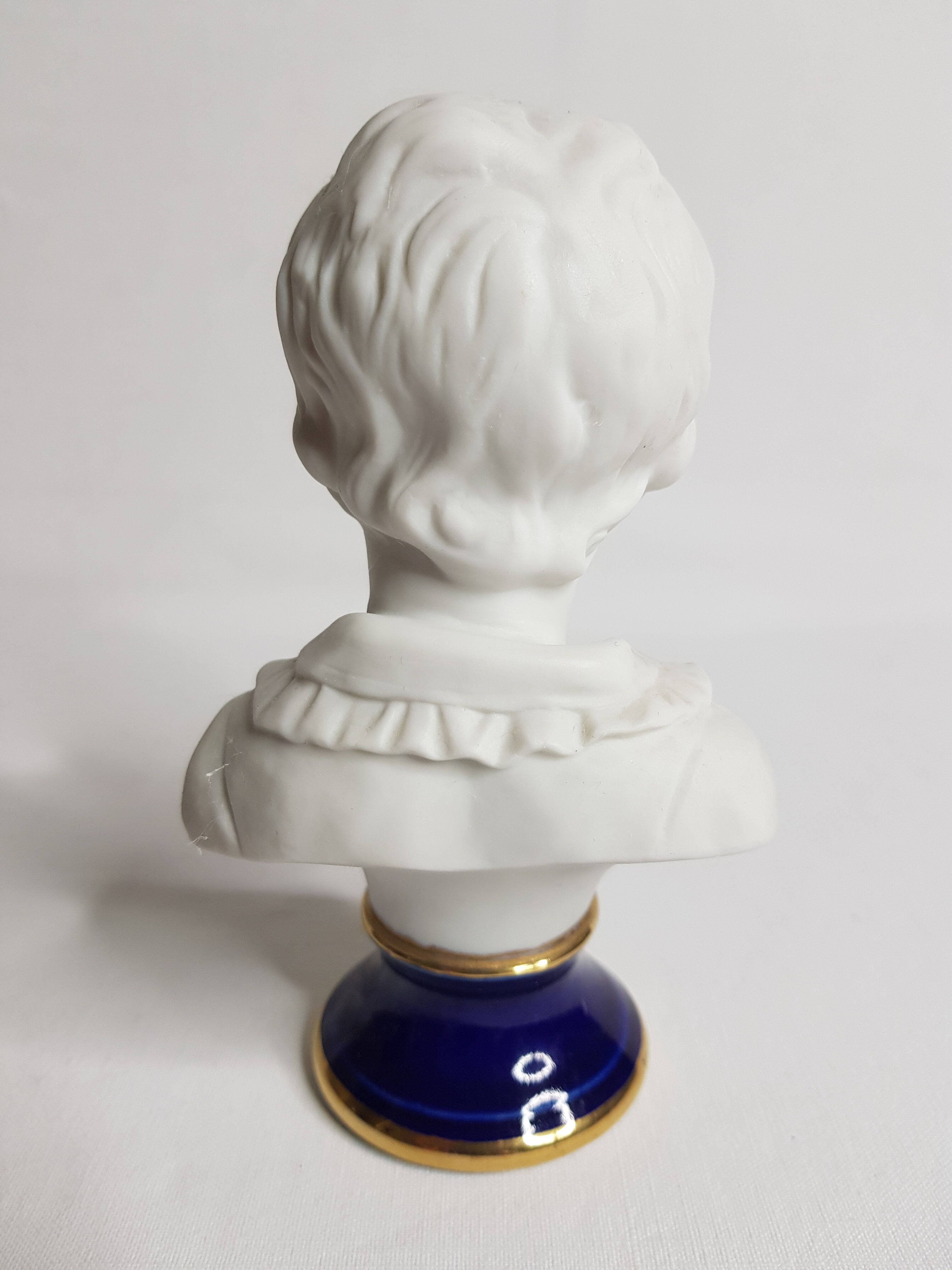Porcelain biscuit bust, child, Alexandre Brongniart after Houdon