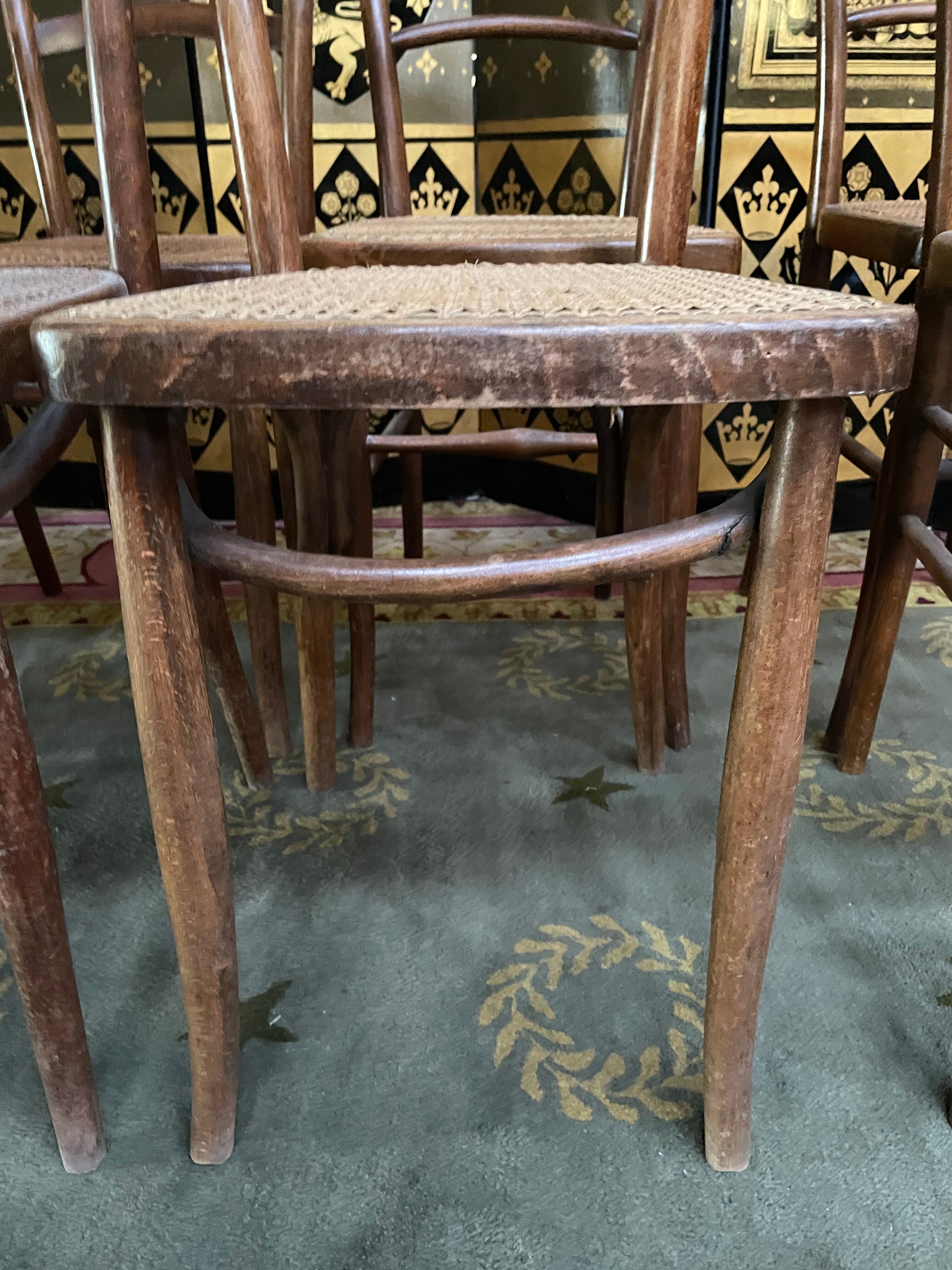 Suite of 10 bistro chairs in cannage
