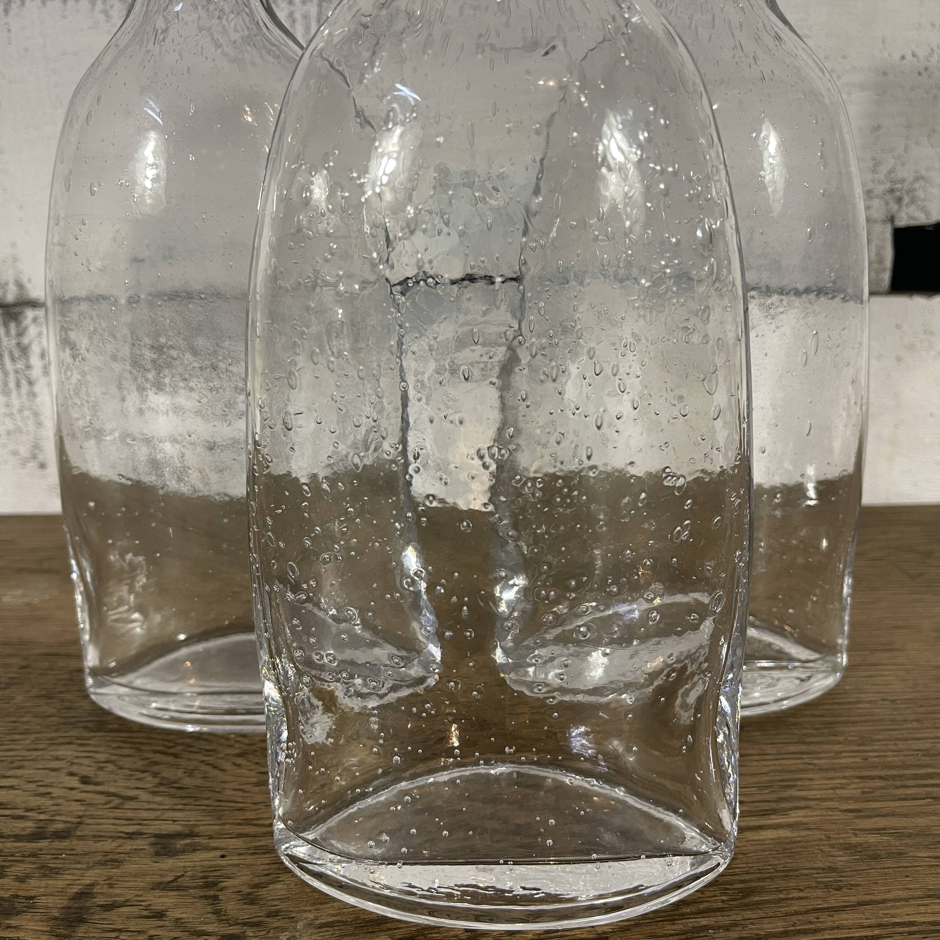 Series of 3 bubbled glass vases