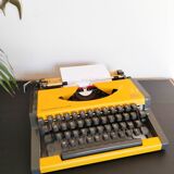 Vintage yellow portable typewriter, functional, AEG, new ribbon