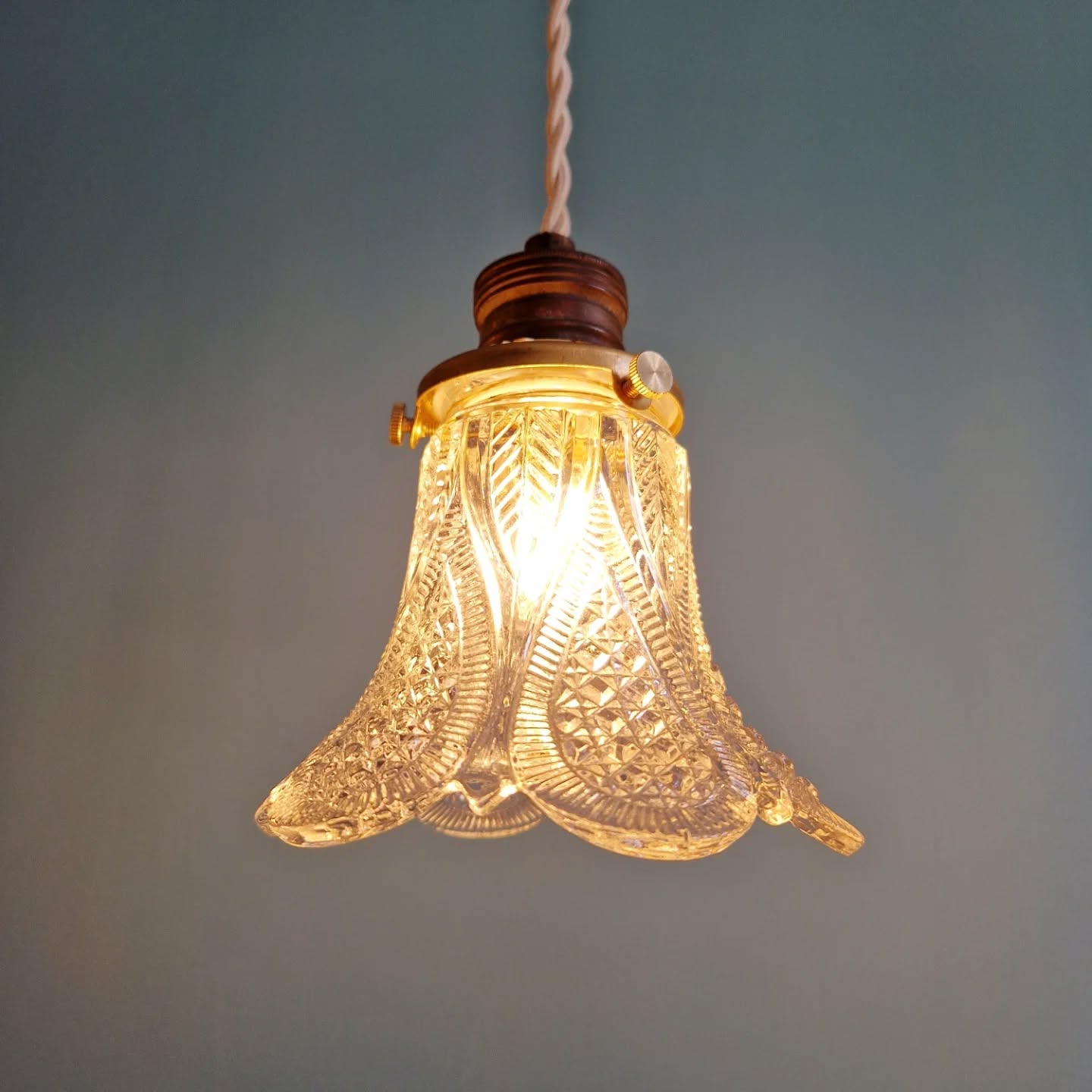 Art Deco trio of pendant lights/table lamps in clear glass, 1920s-30s.