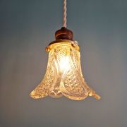 Art Deco trio of pendant lights/table lamps in clear glass, 1920s-30s.