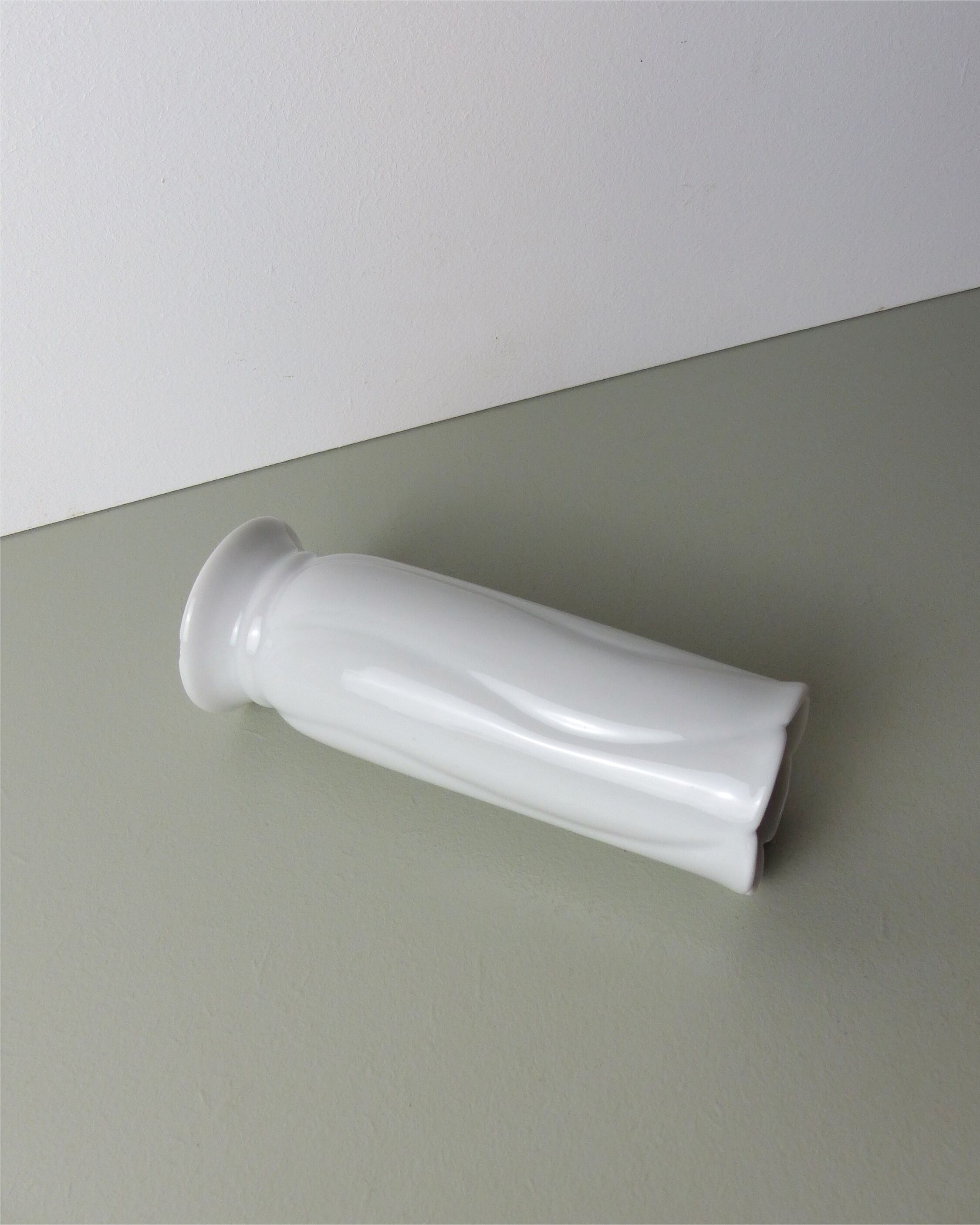 White porcelain tube vase
