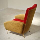 Red and mustard yellow fabric armchair in 1970s style