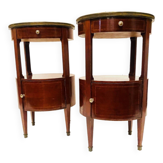 Pair of oval Louis XVI style bedside tables in mahogany and 20th century veneer