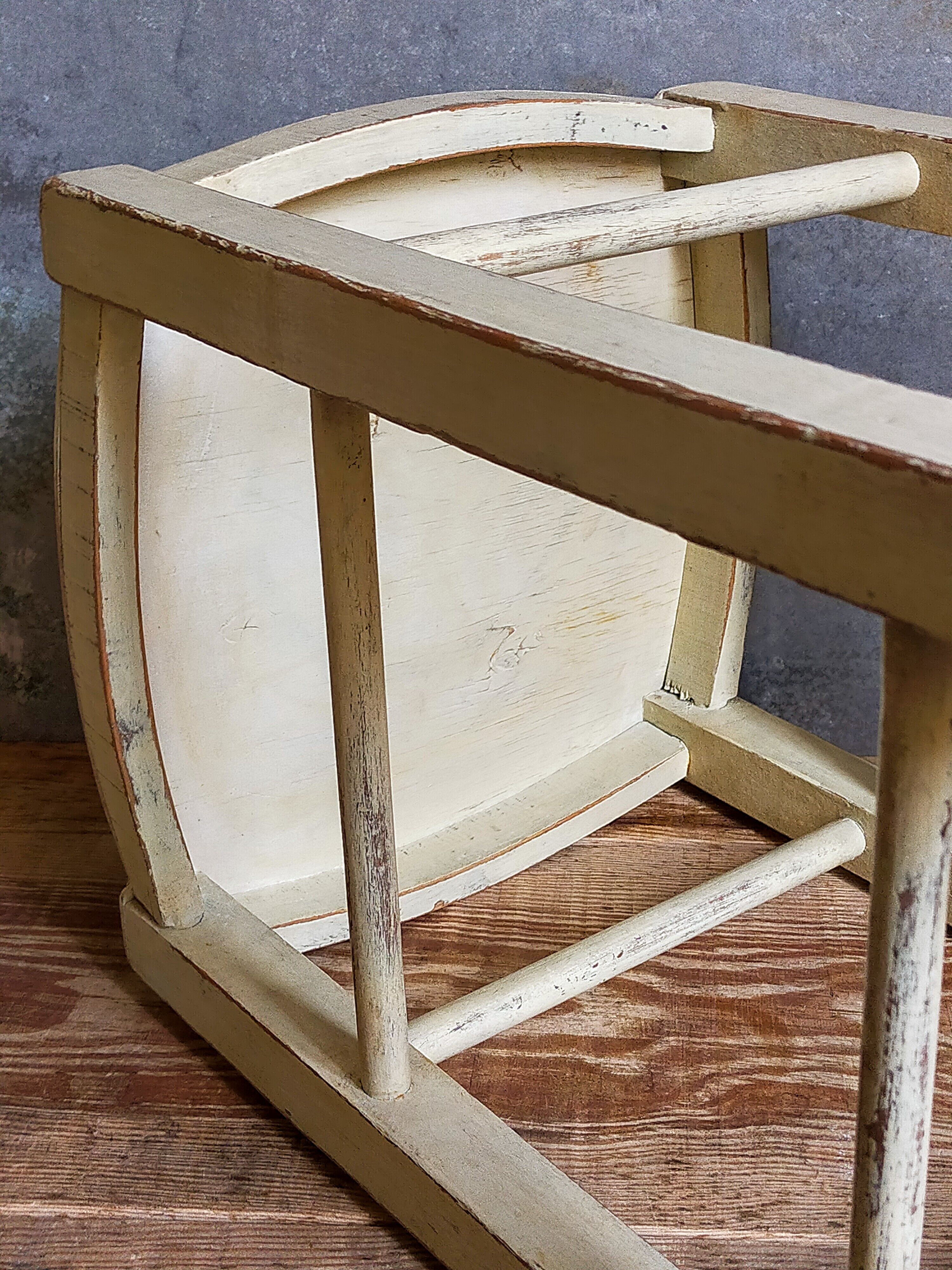 Old patinated painted wooden stool