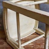 Old patinated painted wooden stool
