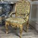 Remarkable small armchair in carved and gilded wood, Venice, early 18th century