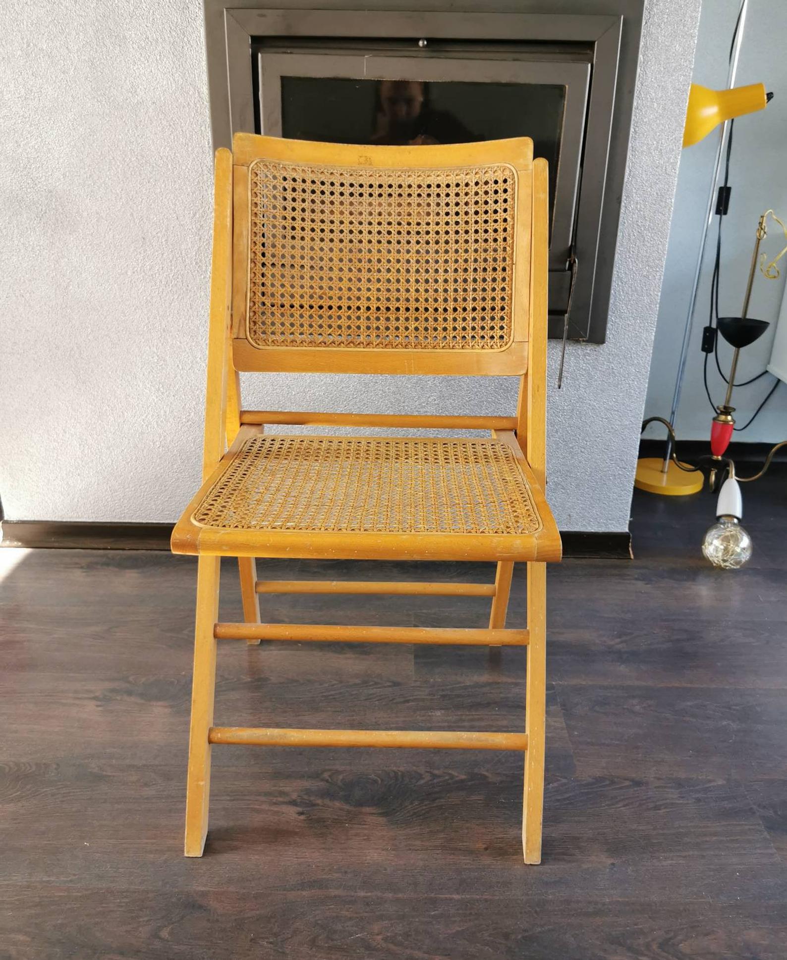 Vintage wooden folding chair with 1970 rattan seat and back
