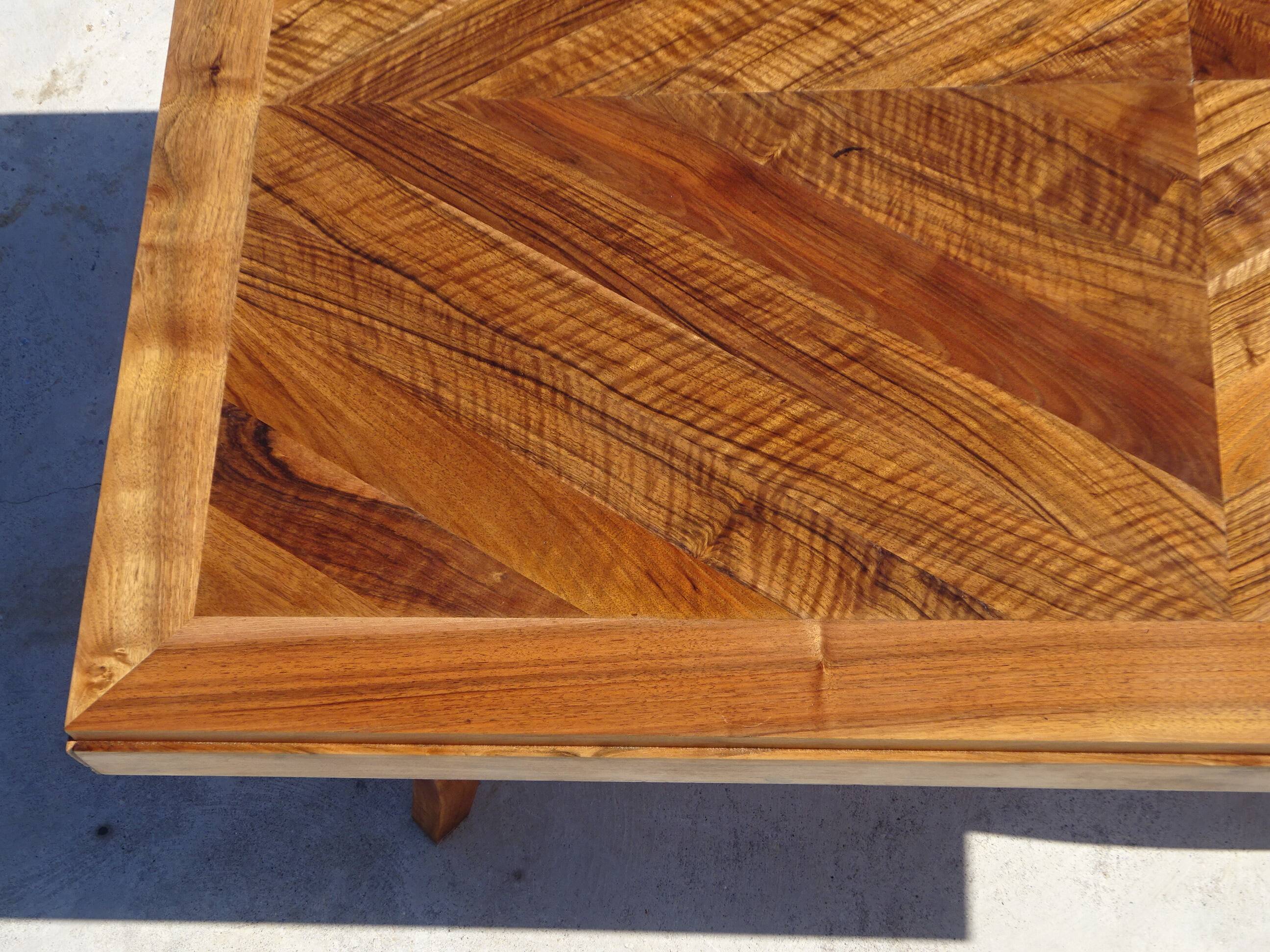 Antique solid walnut table with marquetry and extensions.