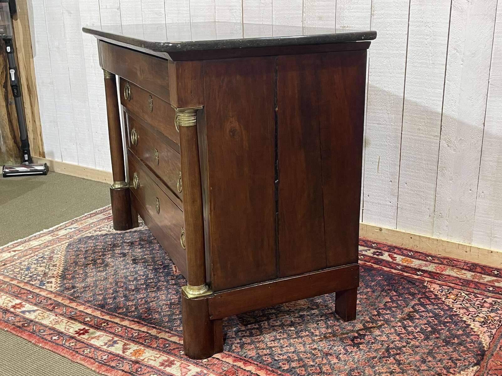 19th century Empire chest of drawers in cherry wood and black marble