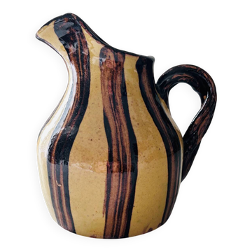 Striped decorative pitcher signed