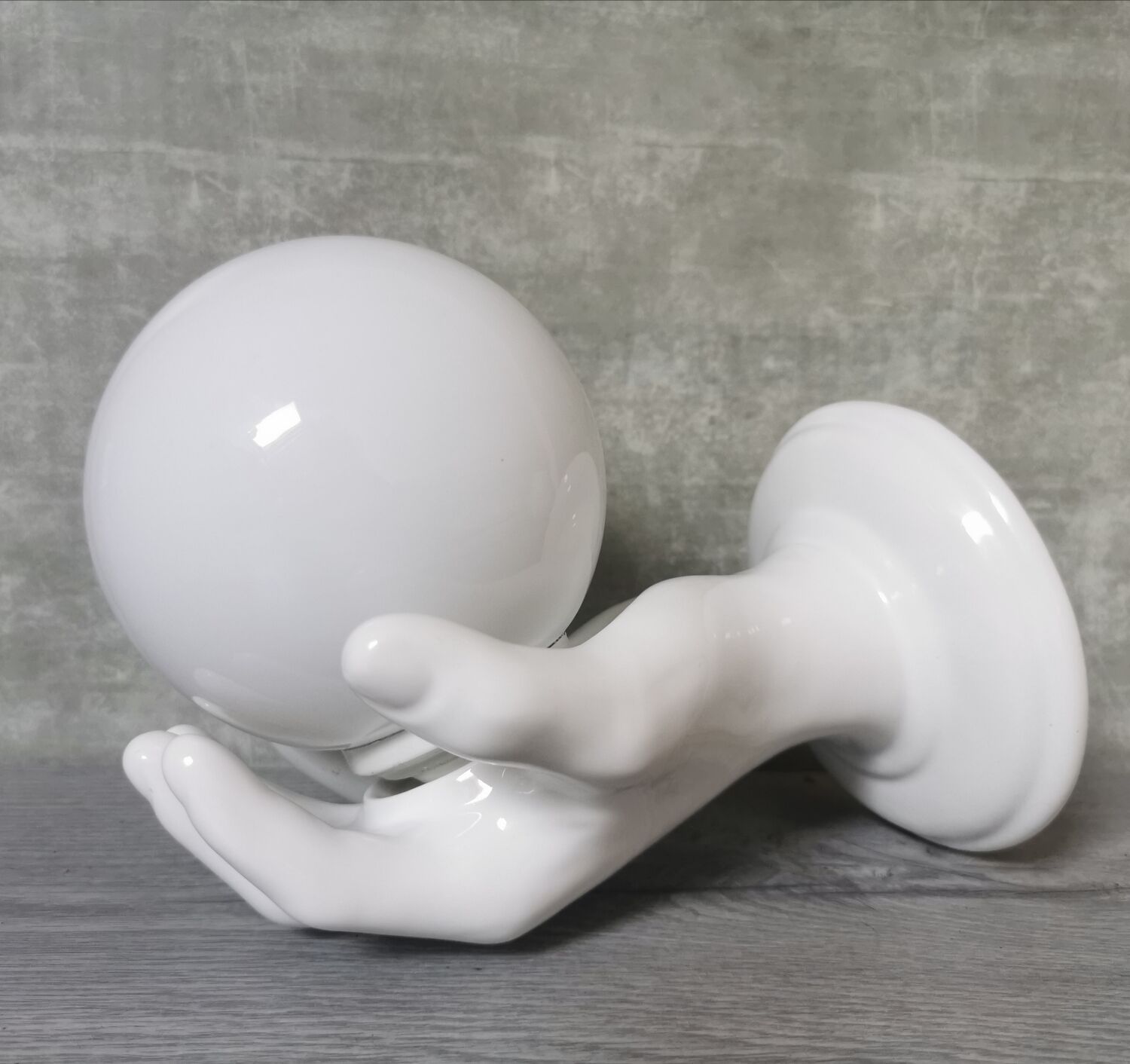 White ceramic hand wall lamp