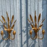 Pair of wall sconces in the shape of a wheat sheaf with two lights.