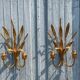 Pair of wall sconces in the shape of a wheat sheaf with two lights.