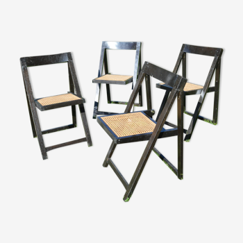 Suite of four folding chairs