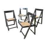 Suite of four folding chairs