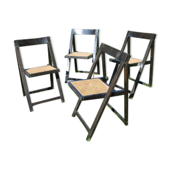 Suite of four folding chairs