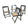 Suite de quatre chaises pliantes cannées