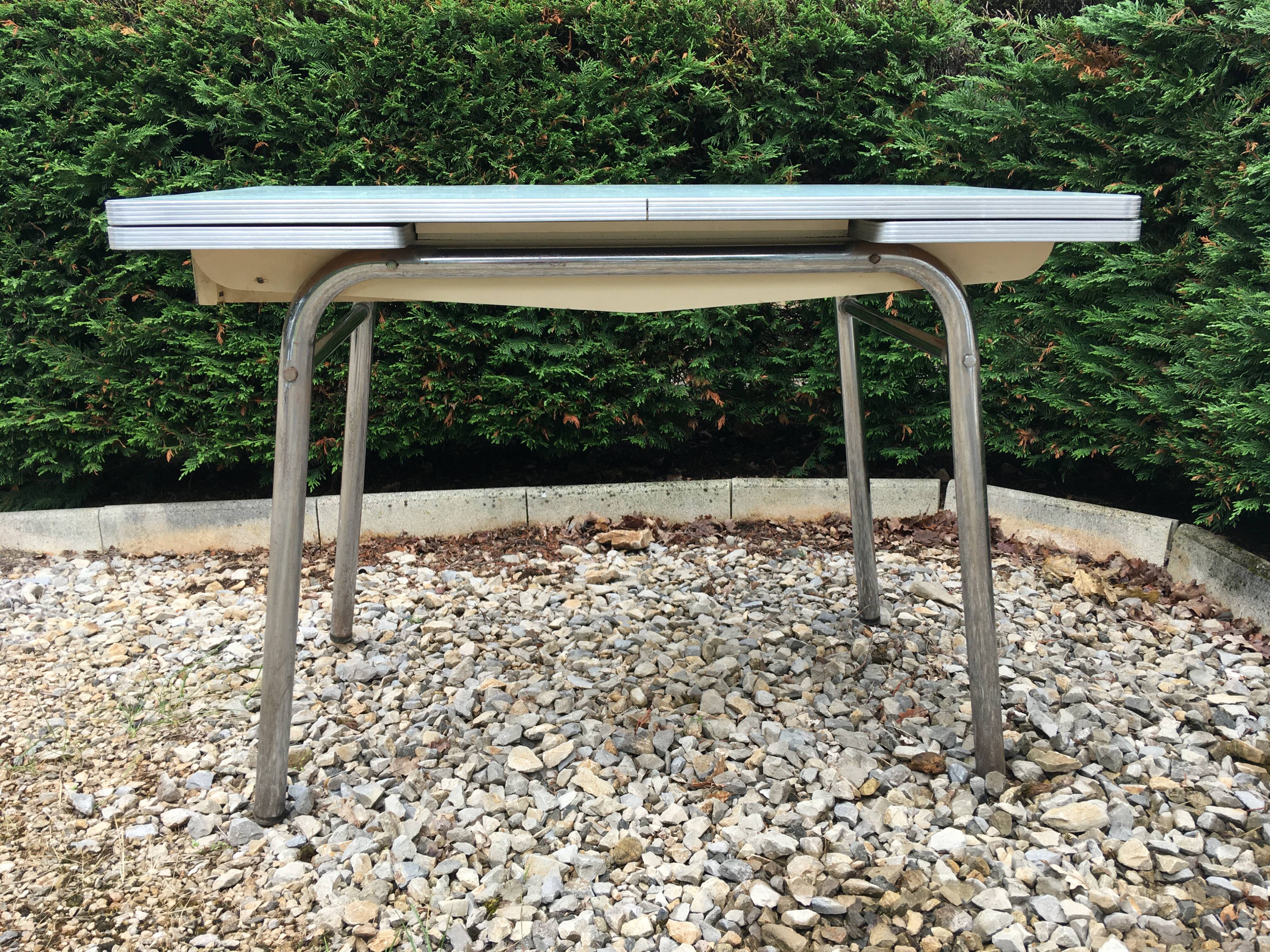 Formica table set with extensions + 4 Plastilux chairs