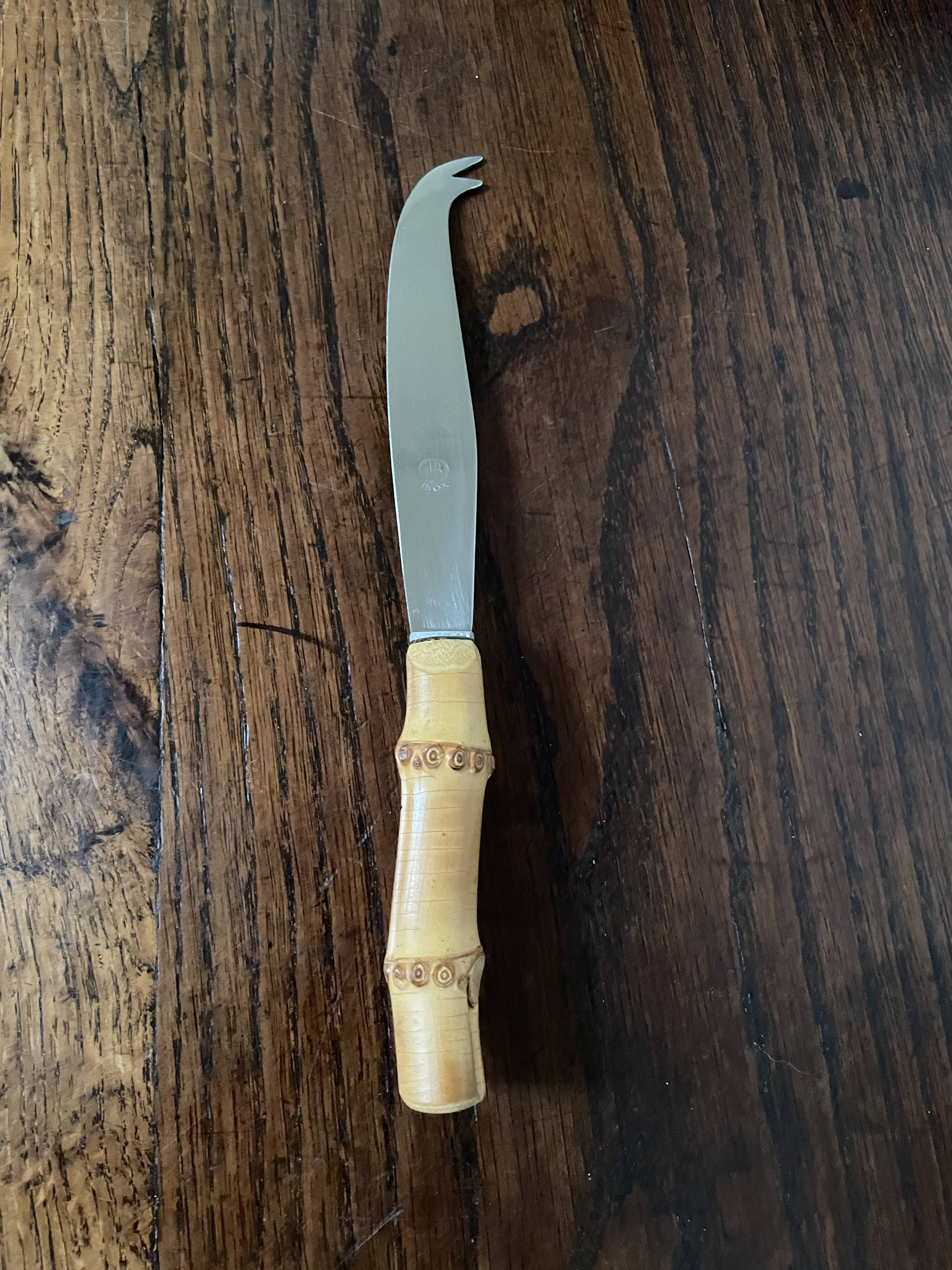 Bamboo handle cheese knife