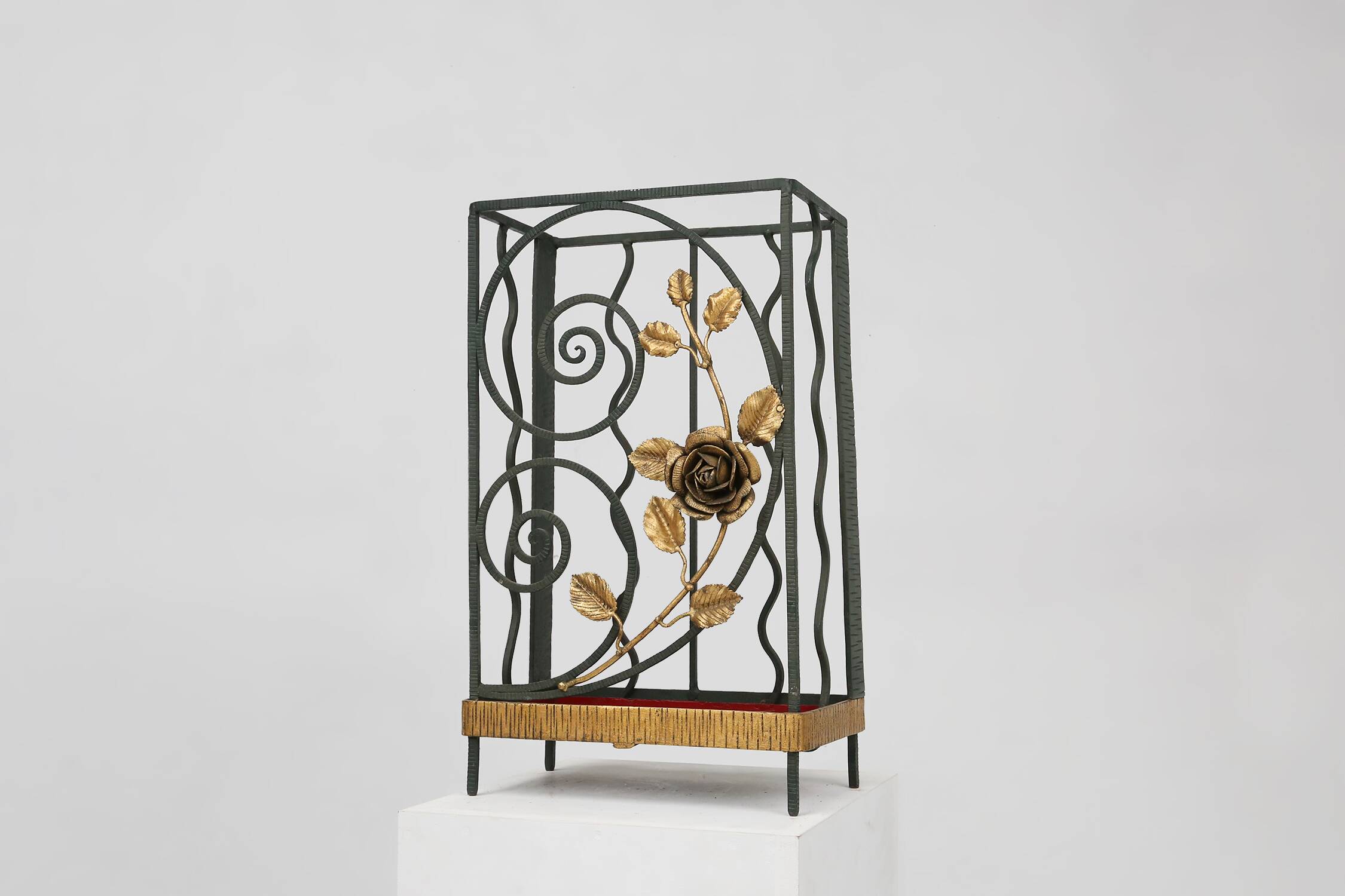 Art deco wrought iron umbrella stand with floral decoration, France ca. 1930