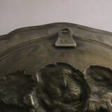 pewter plate with flower decoration