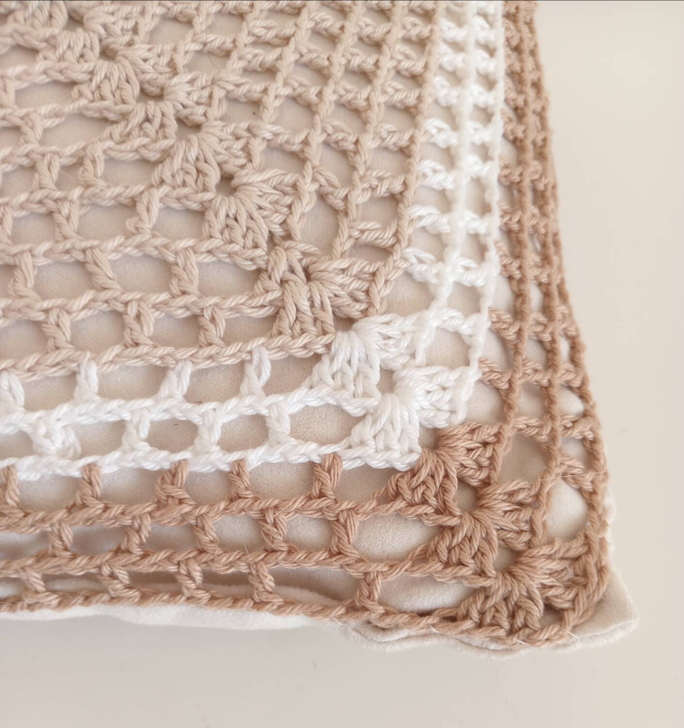 Pair of crocheted cushions