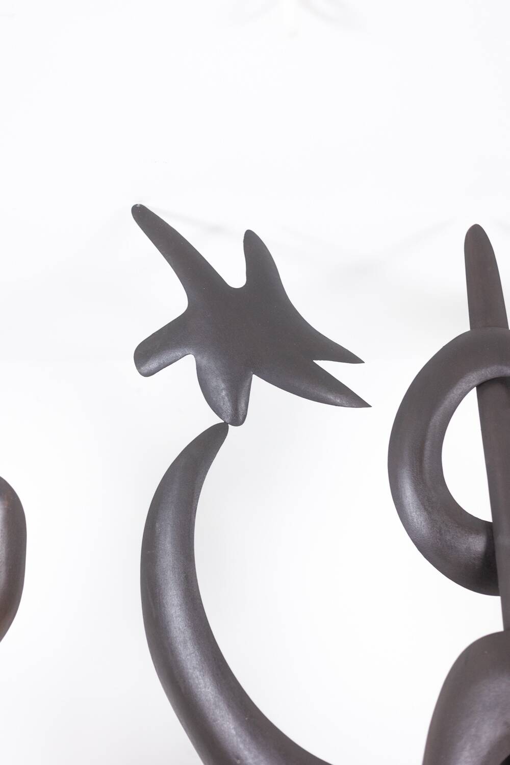 Antonine de Saint Pierre. Curved metal sculpture. Contemporary work.