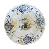 Plat ancien restauré à motif floral