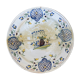 Restored antique dish with floral motif
